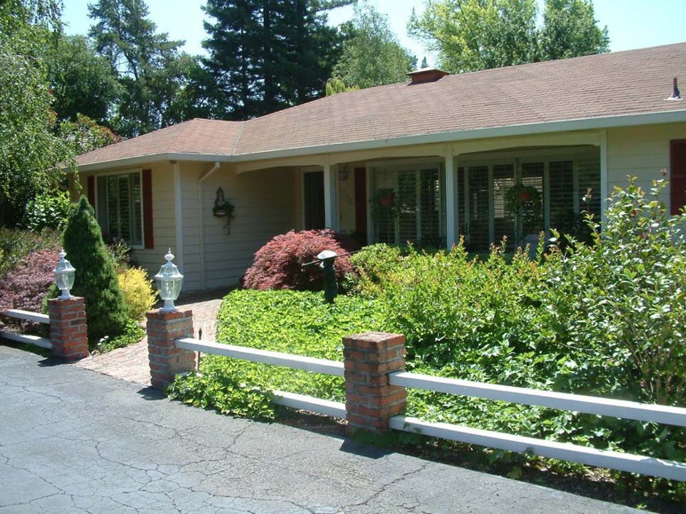 Split Rail Fench and Ranch House